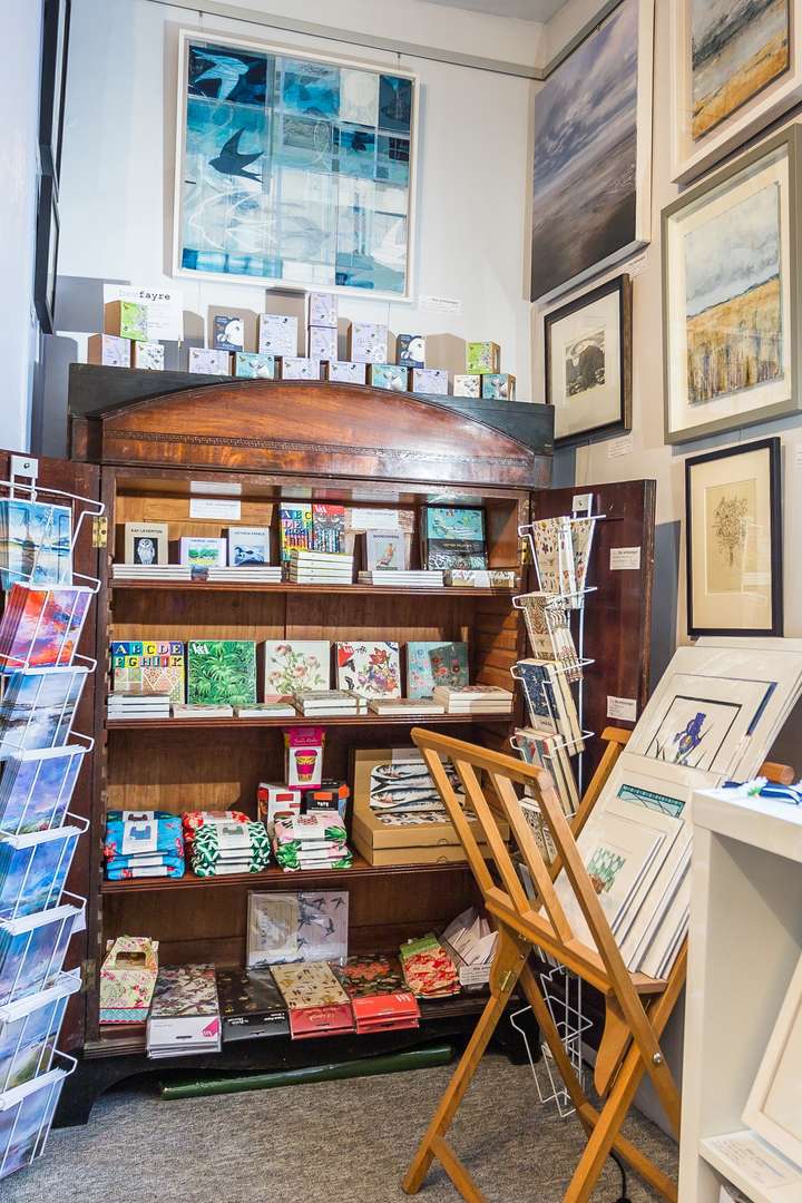 Shelves and spinners of greetings cards and notebooks